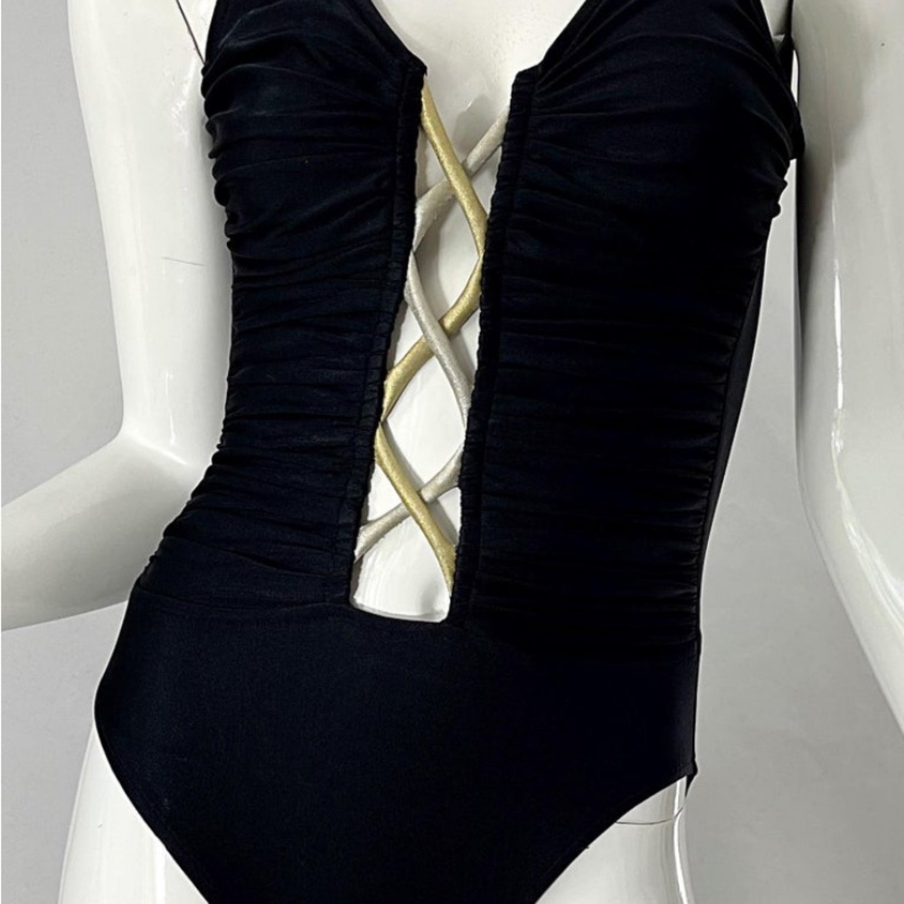 Designer BILL BLASS one piece swimsuit. Features metallic gold rope detail